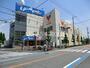 スーパー　コモディイイダ川口芝店（スーパー）まで404m