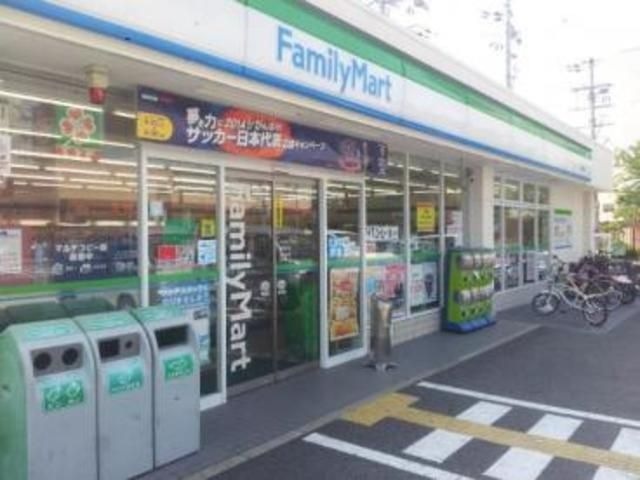 コンビニ　ファミリーマート西成松店（コンビニ）まで446m