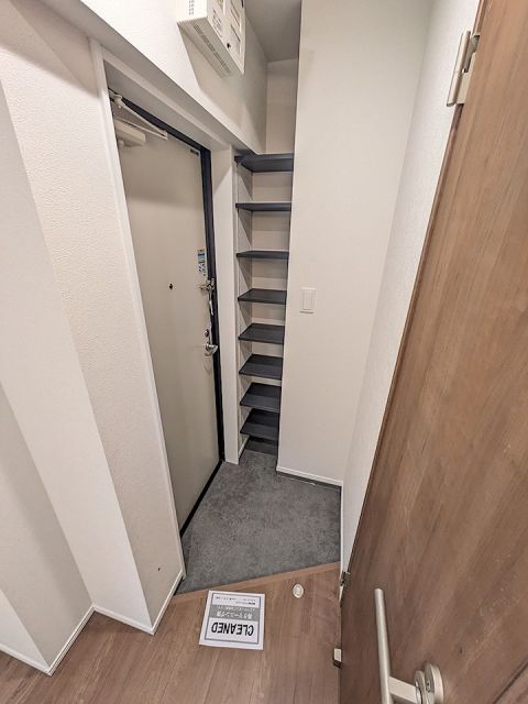 MELLAS志茂IIの玄関写真
