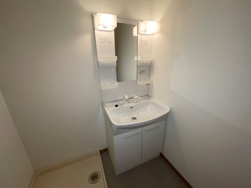 洗面設備　※201号室の写真です。