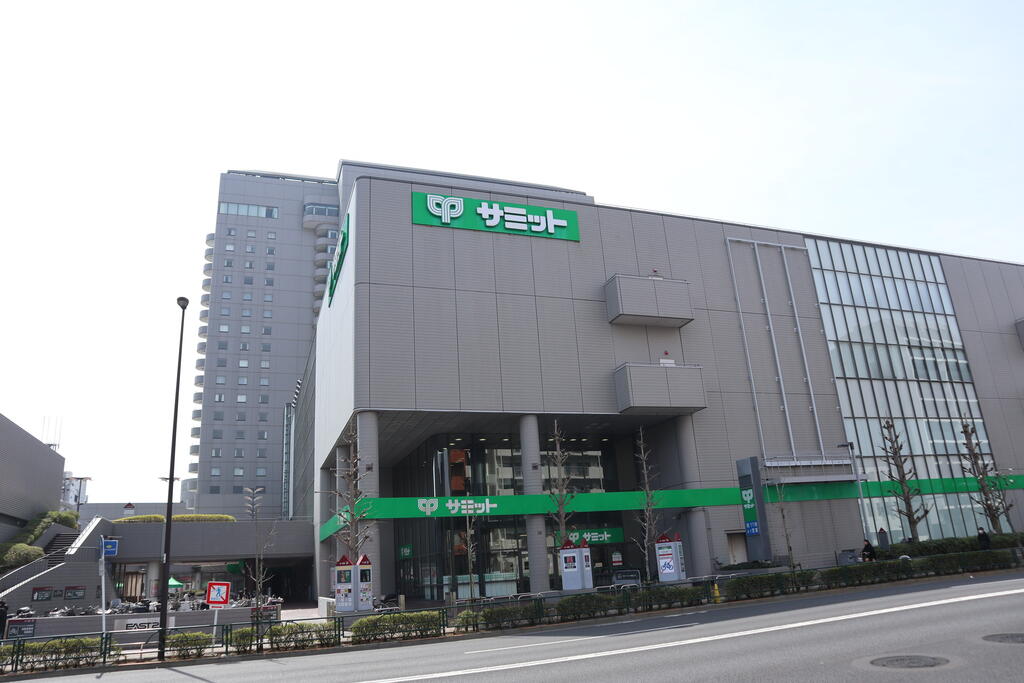 スーパー　サミットストアイースト21店（スーパー）まで506m