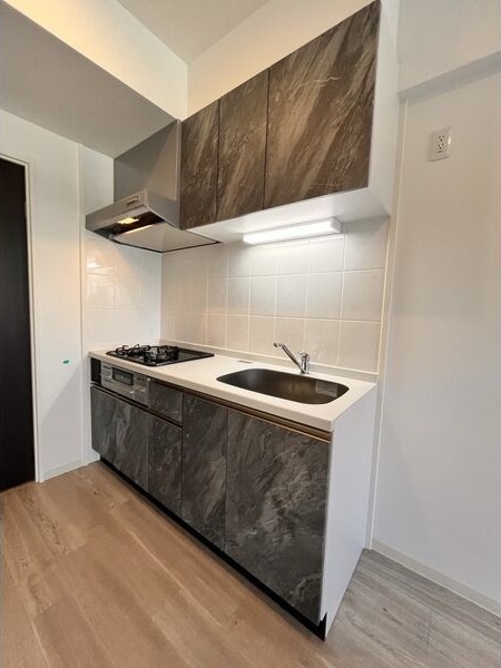 キッチン　※写真は同じマンションの違う部屋のものになります。