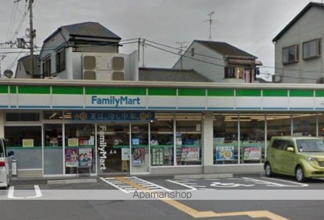 コンビニ　ファミリーマート（コンビニ）まで1054m