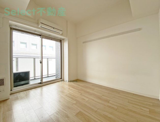 プレサンス丸の内城雅の居間写真
