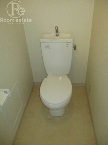 地下鉄御堂筋線 昭和町駅 徒歩1分 8階建 築20年のトイレ写真