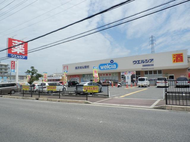 ドラックストア　ウエルシア羽曳野南恵我之荘店（ドラッグストア）まで989m