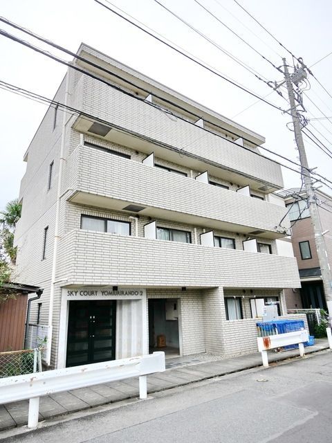 【川崎市多摩区菅城下のマンションの建物外観】