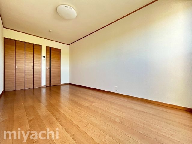 ティラーノ藍住II 1号棟の居間写真