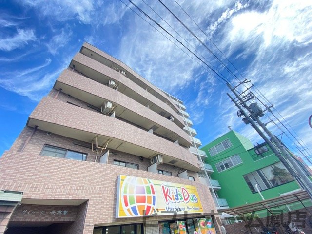 堺市西区鳳南町のマンションの建物外観