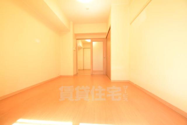地下鉄御堂筋線 大国町駅 徒歩8分 10階建 築15年の居間写真