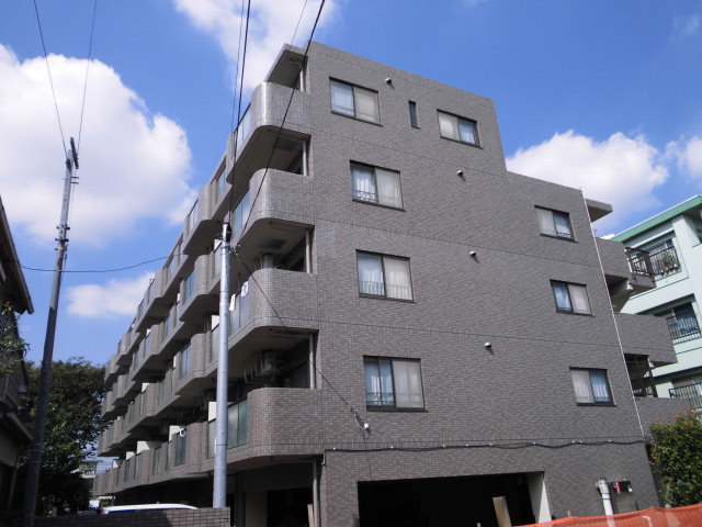 建物外観　外観タイル貼・エレベーター完備・コンビニ至近