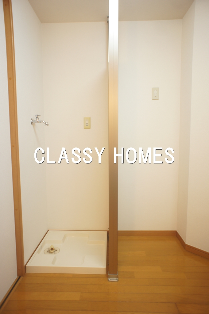 その他設備　2002年竣工グランヴァン大井町II：洗濯機置き場