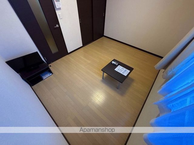 レオパレスカーサ ソレアードの居間写真