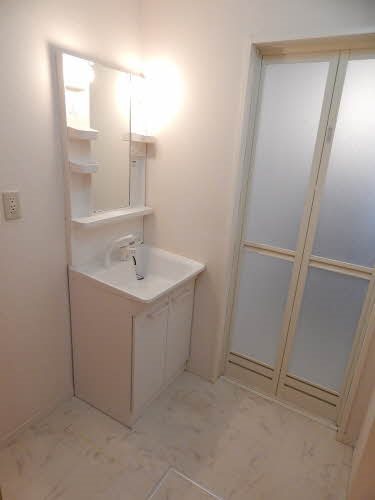 洗面設備　※別号室の写真です。