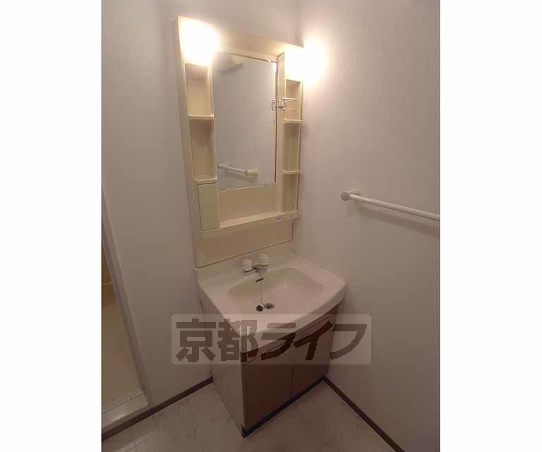 洗面設備　２０３号室の写真です。