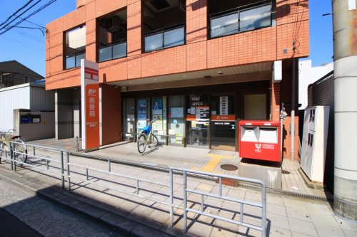 郵便局　東淀川小松二郵便局（郵便局）まで386m
