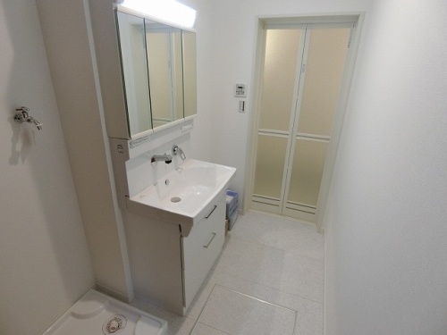 洗面設備　写真は現在建築中の状況です。