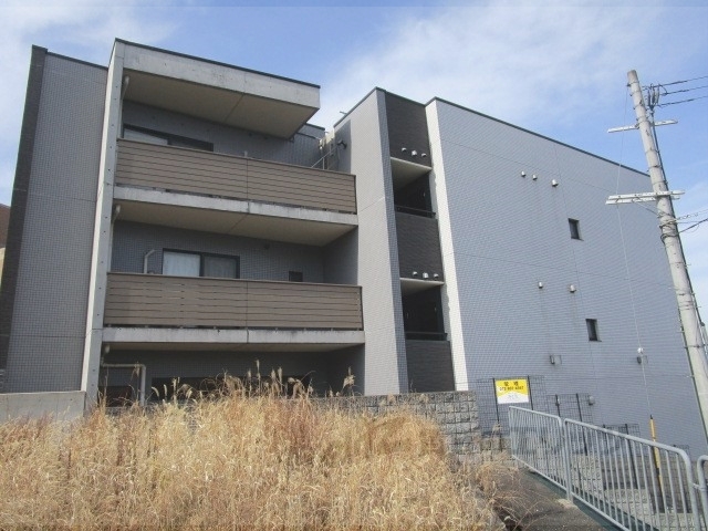 枚方市田宮本町のマンションの建物外観