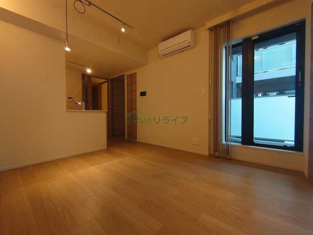 Lumina Court Takaidoの居間写真