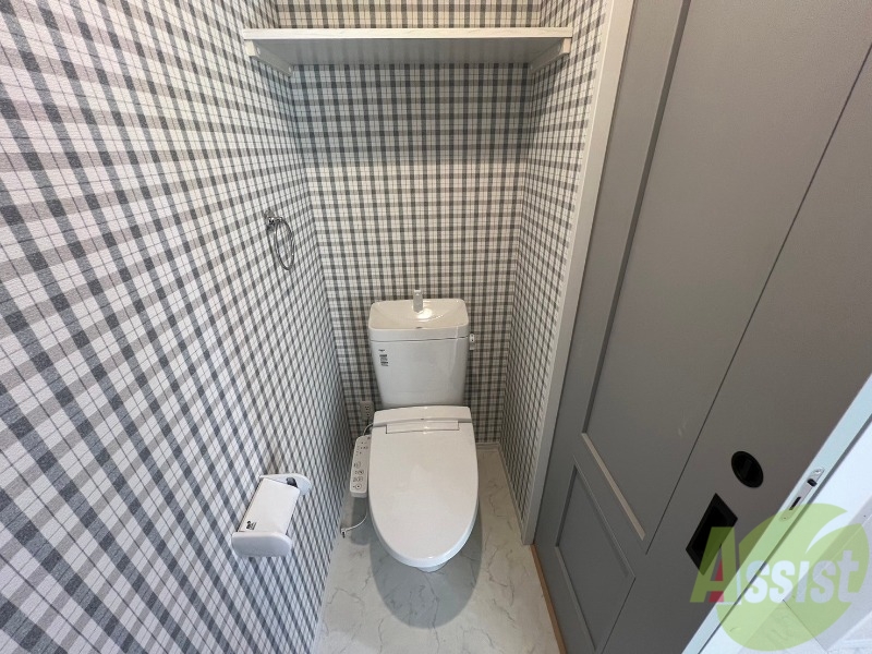 トイレ　温水洗浄便座付きトイレなので快適です。チェック柄が素敵です。