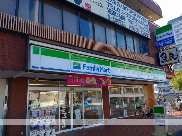 コンビニ　ファミリーマート北綾瀬駅前店（コンビニ）まで355m