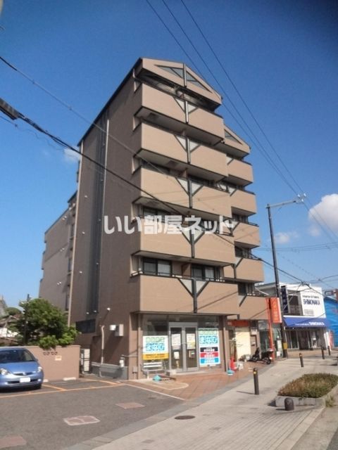 泉佐野市高松北のマンションの建物外観