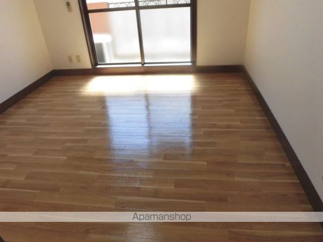レジデンスアサミズ砂屋戸の居間写真
