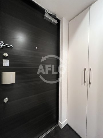 玄関　グランカリテ塚本　玄関