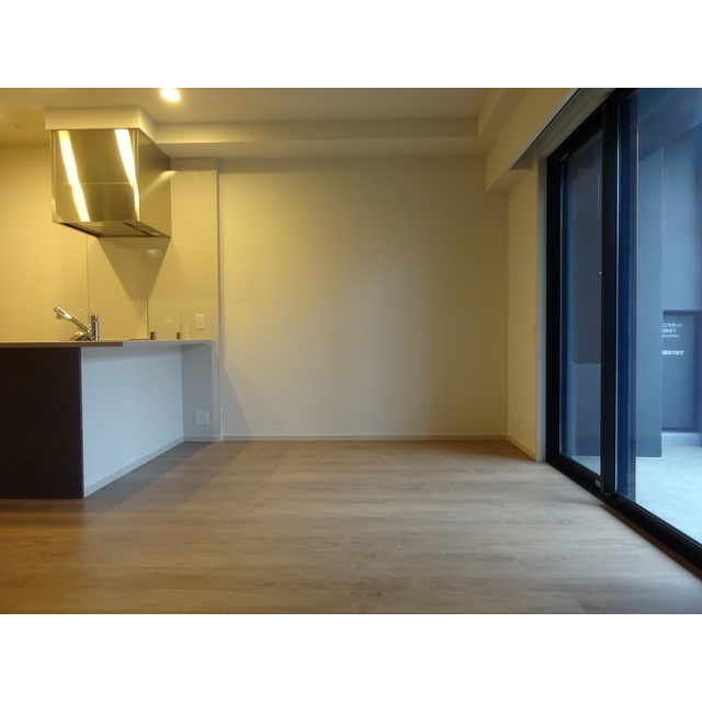 ブラントン六本松 203号の居間写真