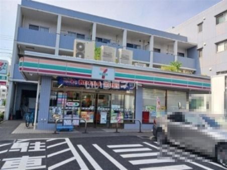 コンビニ　セブン-イレブン 矢野口中央店（コンビニ）まで877m