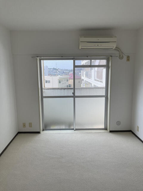 キャッスルマンション東寺尾の居間写真