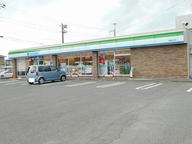 コンビニ　ファミリーマート西条古川店（コンビニ）まで1000m