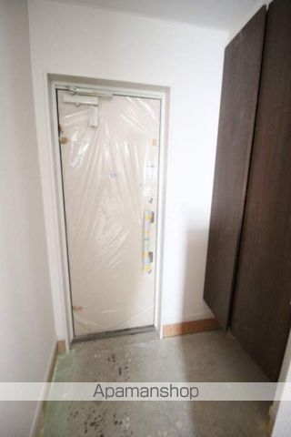 北13東13テラスハウスの玄関写真
