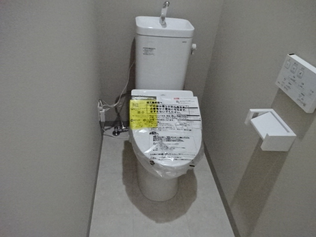 ハピネス ドミ-ルA十和田宅建メイトのトイレ写真