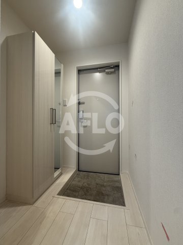 玄関　ハーモニーテラス平野市町　玄関