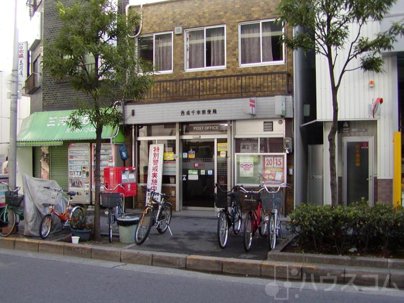 郵便局　西成千本郵便局（郵便局）まで298m