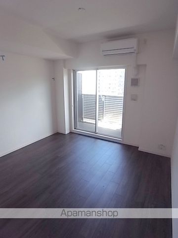 スワンズ谷町セントシティの居間写真