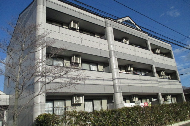 仙台市泉区松森のマンションの建物外観