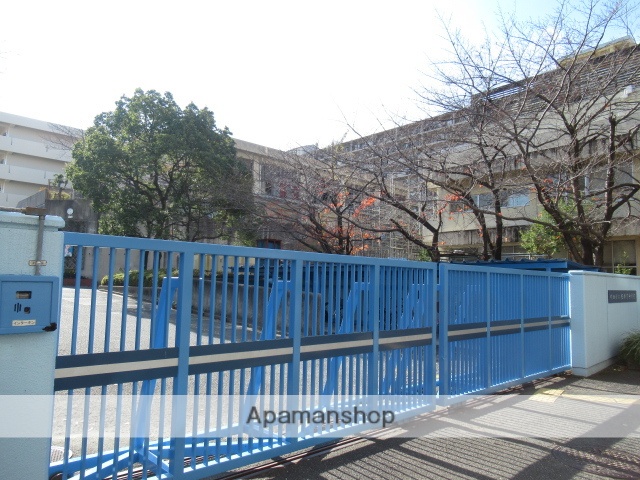 中学校　吹田市立佐井寺中学校（中学校）まで909m
