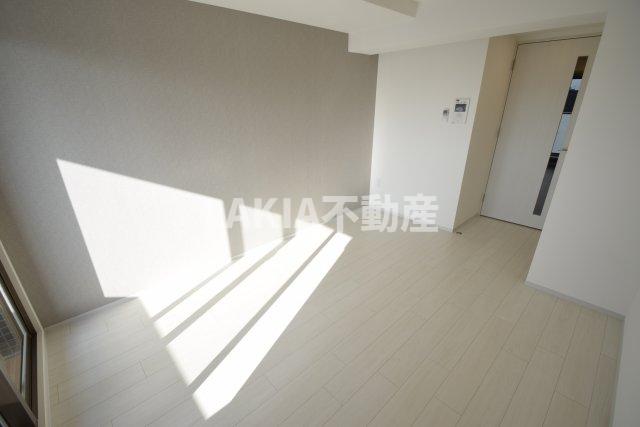 レジュールアッシュ ウエストレジスの居間写真
