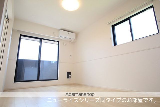 華城中央2丁目アパートの居間写真
