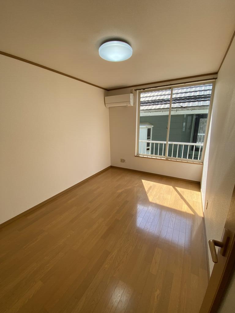 グリーンハイツ11号棟の居間写真