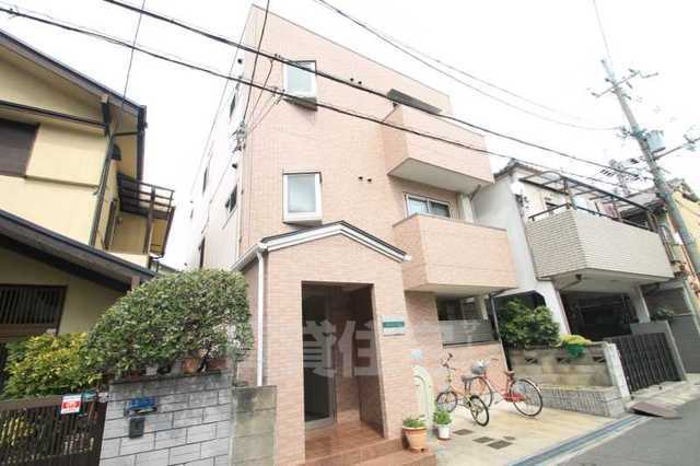 【寝屋川市香里西之町のマンションの建物外観】