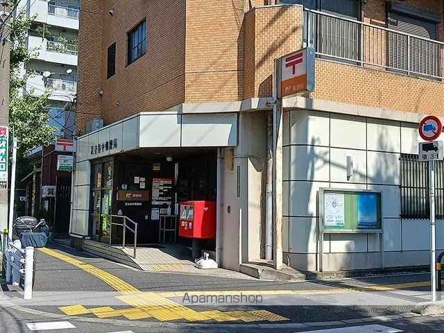 郵便局　足立谷中郵便局（郵便局）まで653m