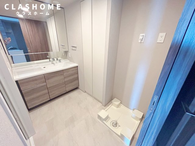 洗面設備　同物件の別部屋になります。