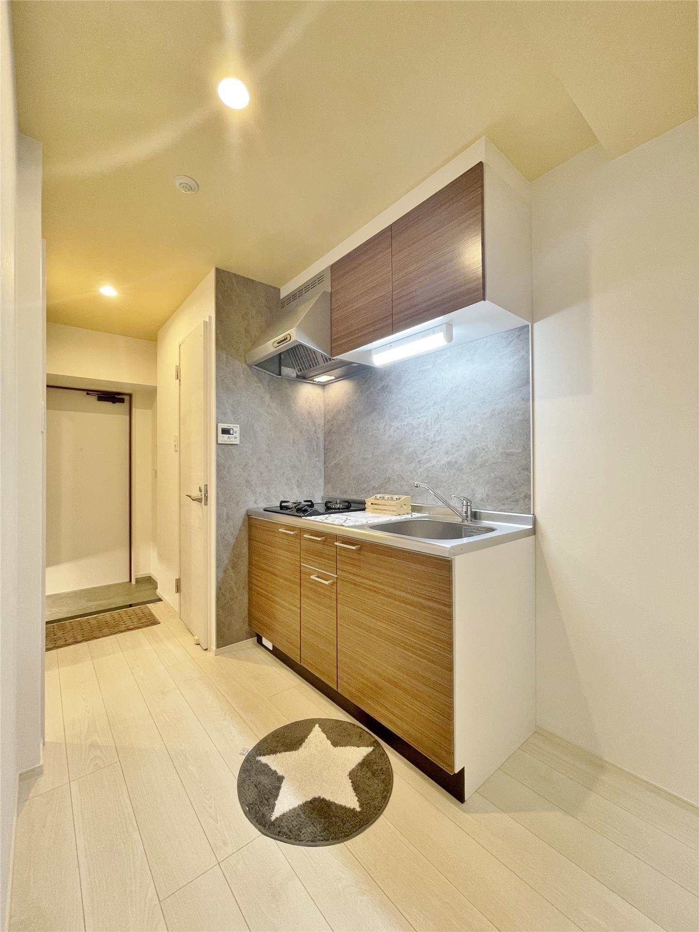 キッチン　※モデルルーム写真のため、入居時家具・備品等はついてきません