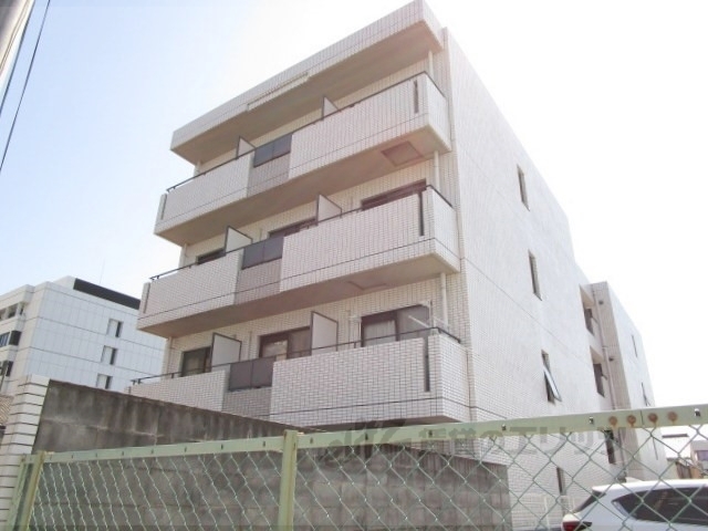京都市南区西九条豊田町のマンションの建物外観