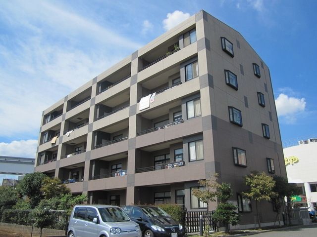 【日野市石田のマンションの建物外観】