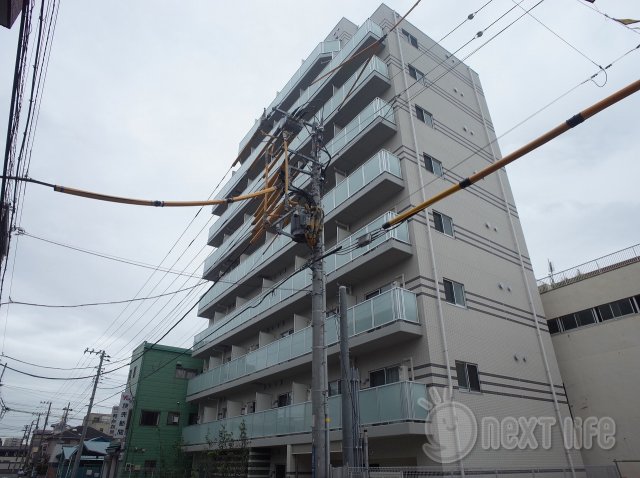 【川崎市川崎区大師駅前のマンションの建物外観】