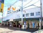 スーパー　グルメシティ稲城店（スーパー）まで597m